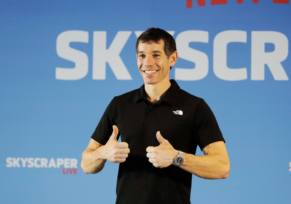 Rock climber Alex Honnold, of the U.S., poses for a photo during a news conference after he completed a free solo climb of the Taipei 101 skyscraper in Taipei, Taiwan, Sunday, Jan. 25, 2026. (AP Photo/Chiang Ying-ying)