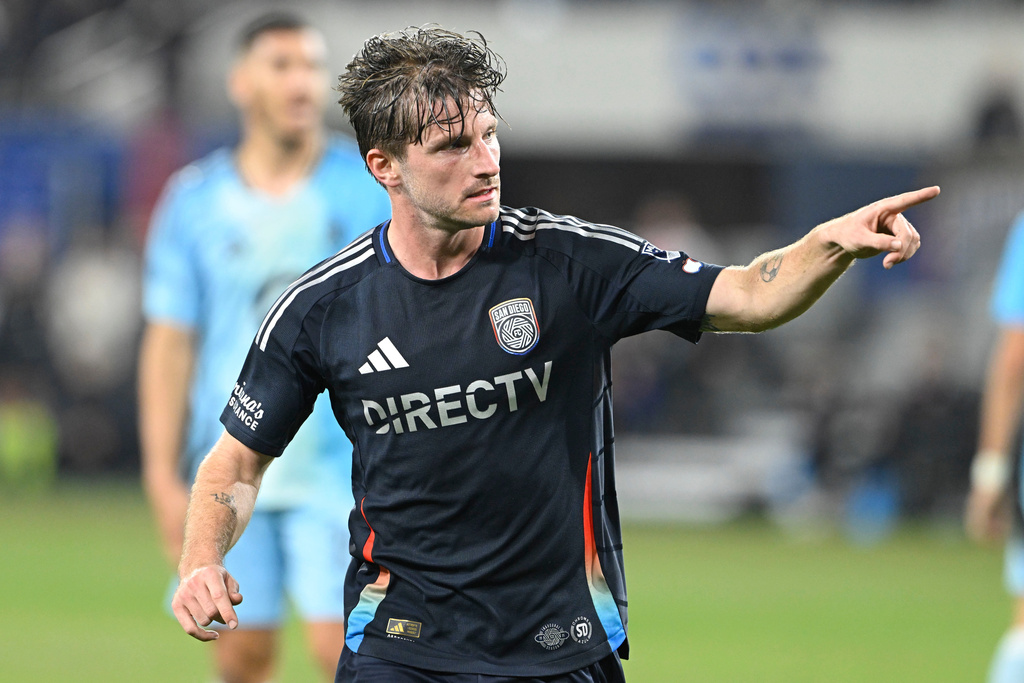 San Diego FC midfielder Anders Dreyer (10) gestures after scoring during the second half of MLS soccer's Western Conference semifinal against Minnesota United Monday, Nov. 24, 2025, in San Diego. (AP Photo/Denis Poroy)