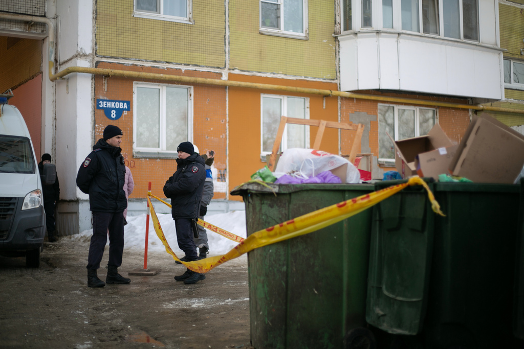 Police officers stand at the site of a planned protest of restrictions on Telegram after authorization for the rally was revoked due to a "potential emergency situation" in Perm, Russia, Sunday, March 15, 2026. (AP Photo)