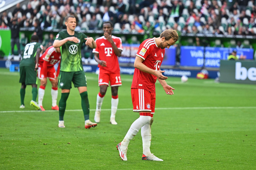 Bayern Munich's Harry Kane reacts after missing a penalty during a Bundesliga soccer match between Wolfsburg and Bayern Munich, in Wolfsburg, Germany, Saturday, May 9, 2026. (Swen Pförtner/dpa via AP)