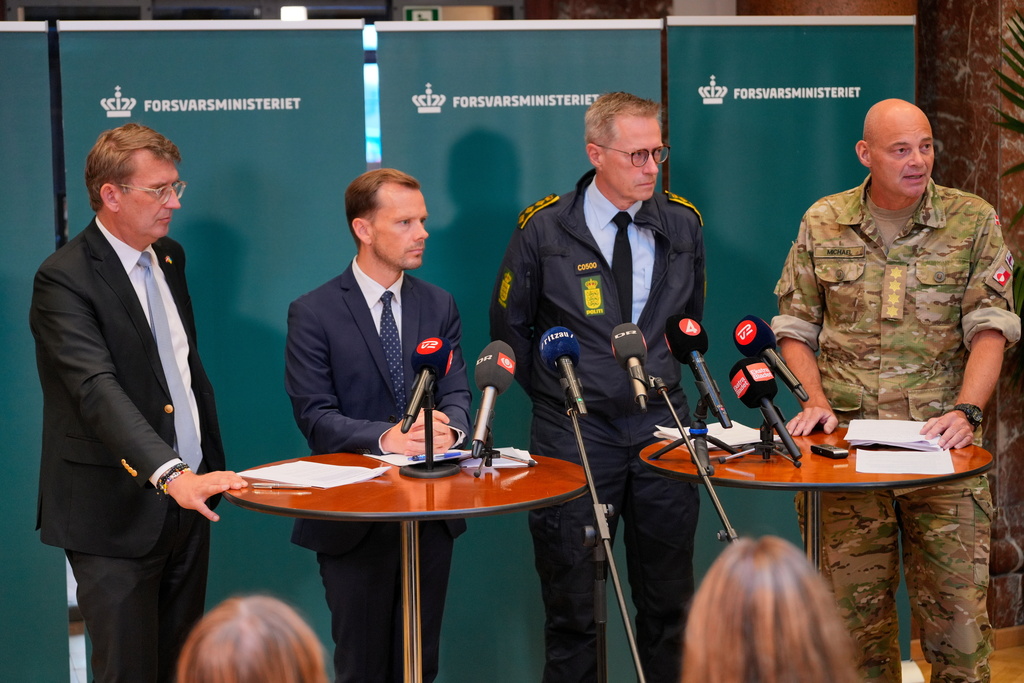From left, Danish Minister of Defence Troels Lund Poulsen, Danish Minister of Justice Peter Hummelgaard, Chief of Police Thorkild Fogde, and Chief of Defense Michael Hyldgaard hold a press conference to provide an update on the recent drone activities at several airports in Denmark, at the Ministry of Defence in Copenhagen, Thursday, Sept. 25, 2025. (Emil Helms/Ritzau Scanpix via AP)
