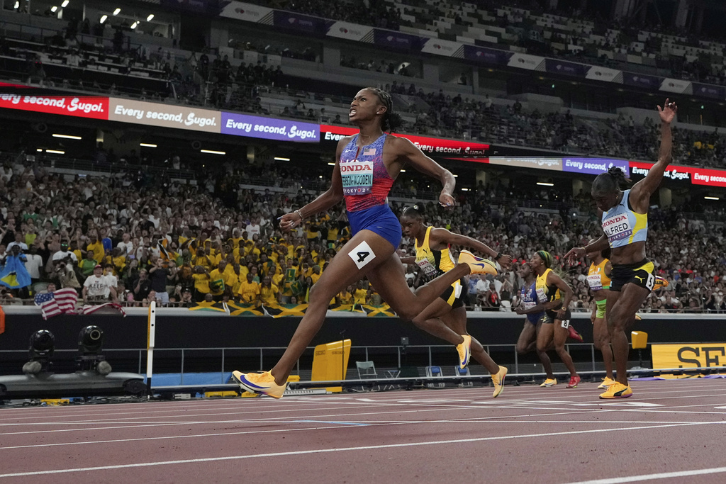United States' Melissa Jefferson-Wooden wins the women's 100 meters final at the World Athletics Championships in Tokyo, Sunday, Sept. 14, 2025. (AP Photo/David J. Phillip)