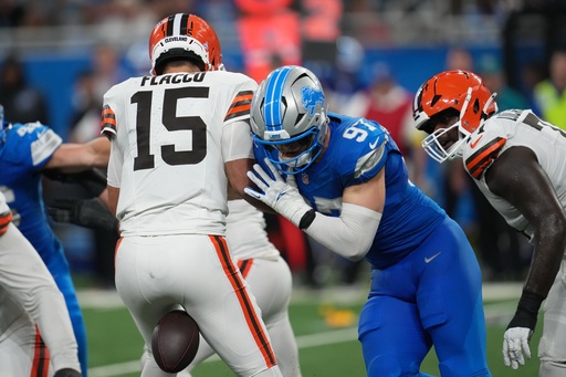 Cleveland Browns quarterback Joe Flacco (15) fumbles as he is hit by Detroit Lions defensive end Aidan Hutchinson (97) during the second half of an NFL football game, Sunday, Sept. 28, 2025, in Detroit. (AP Photo/Paul Sancya) Cleveland Browns quarterback Joe Flacco (15) fumbles as he is hit by Detroit Lions defensive end Aidan Hutchinson (97) during the second half of an NFL football game, Sunday, Sept. 28, 2025, in Detroit. (AP Photo/Paul Sancya)