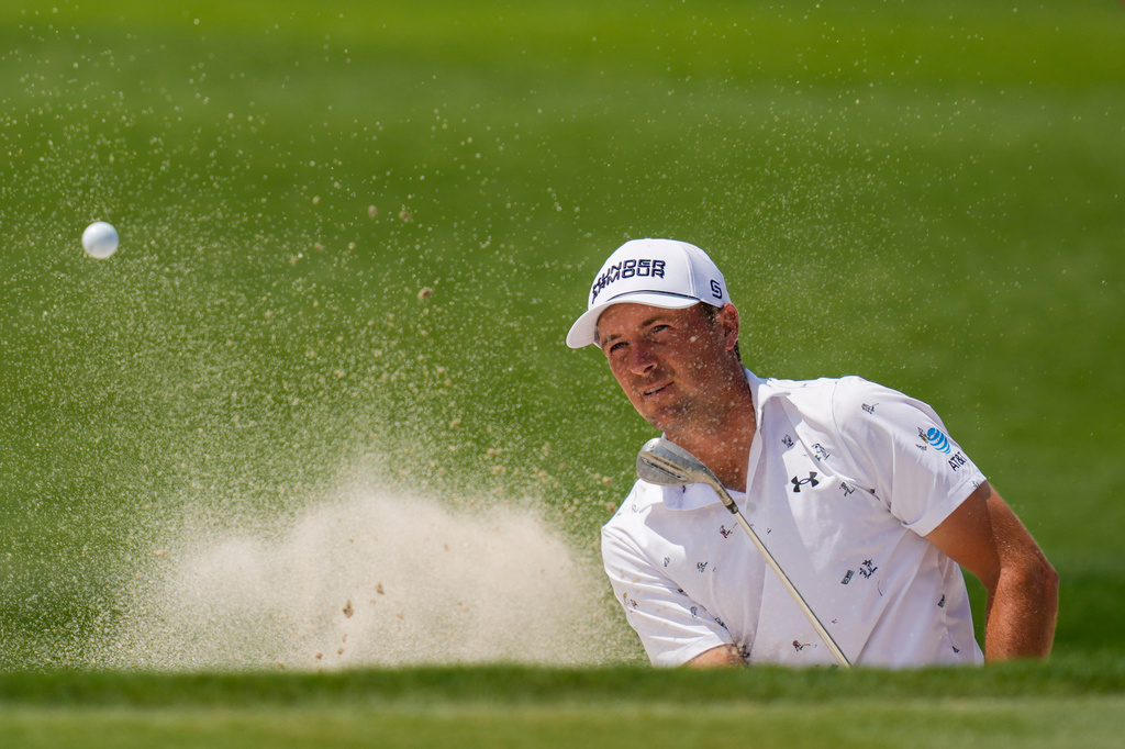 Jordan Spieth hits from the 16th green bunker during the first round of the Cadillac Championship PGA golf tournament Thursday, April 30, 2026, in Doral, Fla. (AP Photo/David J. Phillip)