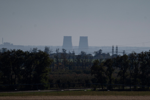 FILE - Zaporizhzhia nuclear power plant is seen from around twenty kilometers away in an area in the Dnipropetrovsk region, Ukraine, Monday, Oct. 17, 2022. (AP Photo/Leo Correa, File) FILE - Zaporizhzhia nuclear power plant is seen from around twenty kilometers away in an area in the Dnipropetrovsk region, Ukraine, Monday, Oct. 17, 2022. (AP Photo/Leo Correa, File)