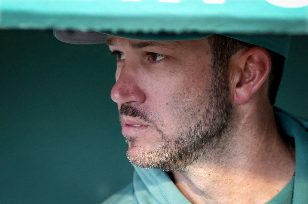 Boston Red Sox interim manager Chad Tracey watches the game from the dugout during the first inning of a baseball game against the Houston Astros, Friday, May 1, 2026, in Boston. (AP Photo/Mark Stockwell)