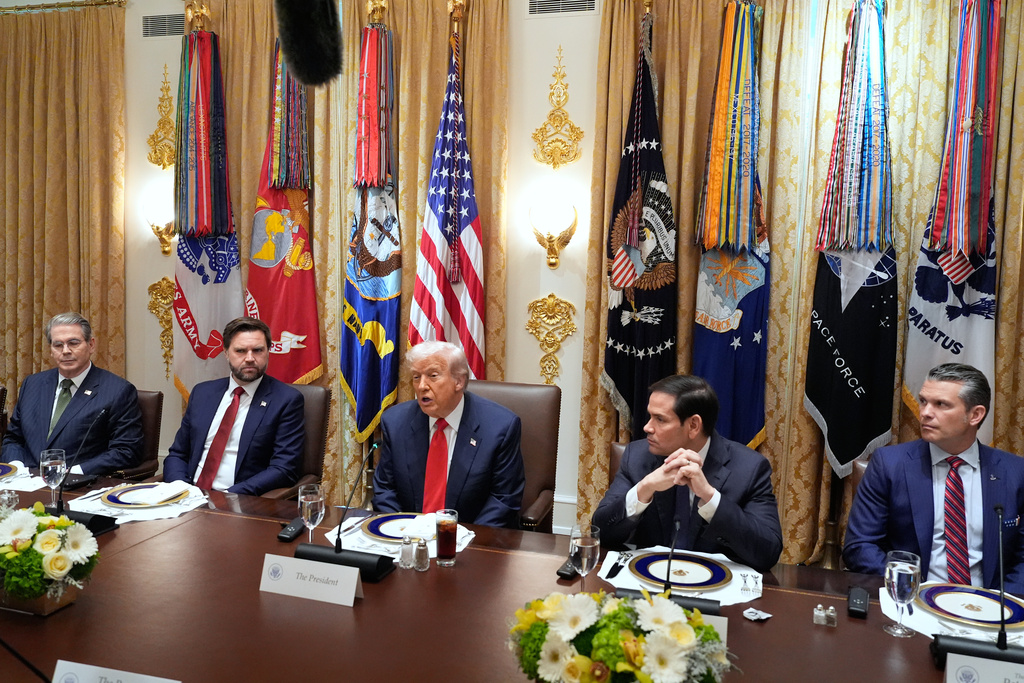 President Donald Trump speaks as he meets with Argentina's President Javier Milei in the Cabinet Room of the White House, Tuesday, Oct. 14, 2025, in Washington, as Treasury Secretary Scott Bessent, Vice President JD Vance, Secretary of State Marco Rubio and Defense Secretary Pete Hegseth listen. (AP Photo/Alex Brandon)