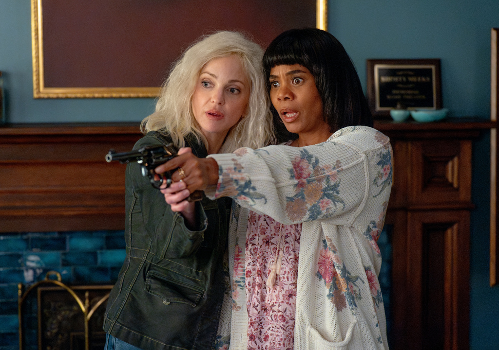 This image released by Paramount Pictures shows Anna Faris, left, and Regina Hall in a scene from "Scary Movie." (Quantrell Colbert/Paramount Pictures via AP)