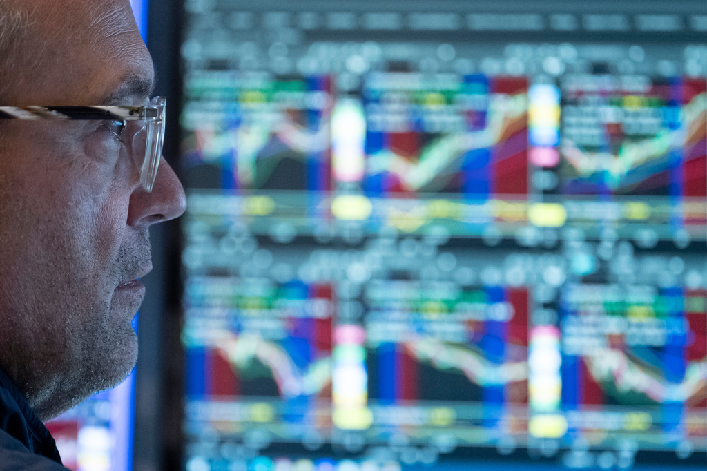 Specialist Anthony Matesic works on the floor of the New York Stock Exchange in New York, Friday, Aug. 21, 2026. (AP Photo/Yuki Iwamura)