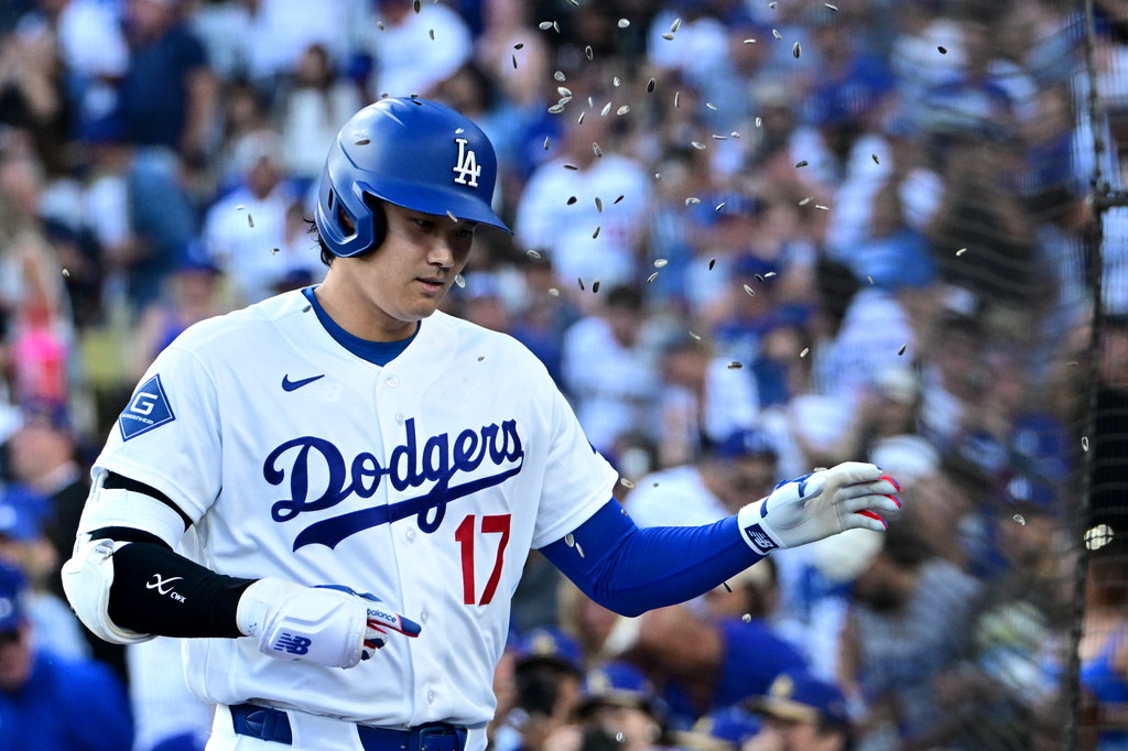 Los Angeles Dodgers Shohei Ohtani (17) celebrates his solo home run against the Seattle Mariners during the first inning of a baseball game Tuesday, July 28 2026, in Los Angeles. (AP Photo/Wally Skalij)