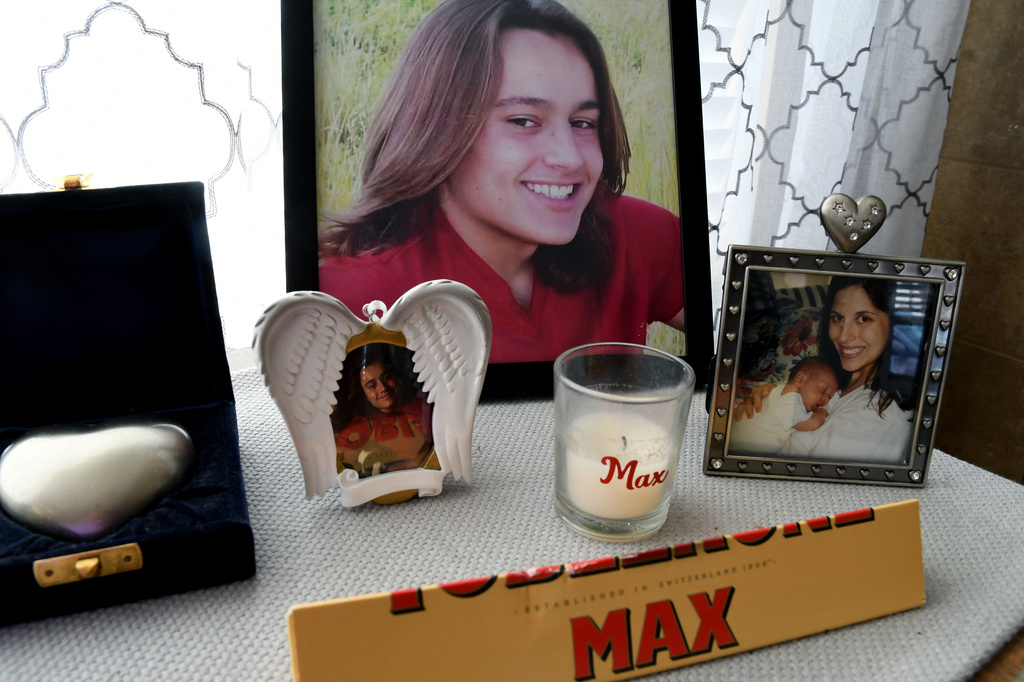A tribute to Max Osterman, whose mother says he died after taking fentanyl he bought from a dealer on Snapchat, is displayed in his mother's living room in Thornton, Colo., Thursday, March 26, 2026. (AP Photo/Thomas Peipert)
