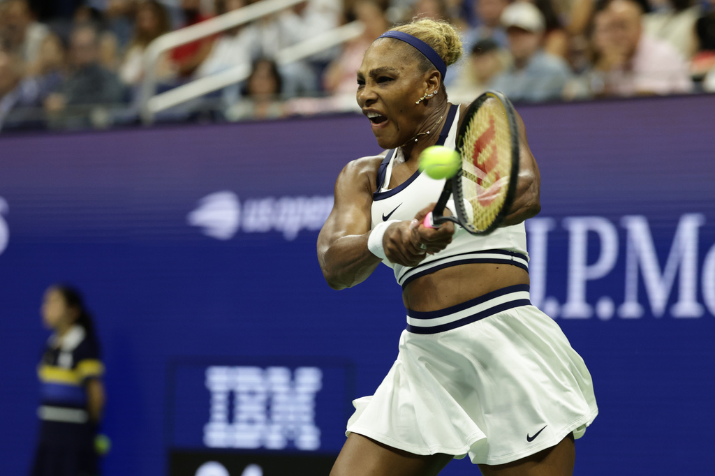 Serena Williams, of the United States, hits a return as she plays a women's doubles match with partner Venus Williams against Hao-Ching Chan, of Taiwan, and Maya Joint, at the U.S. Open tennis championships, Friday, Sept. 4, 2026, in New York. (AP Photo/Adam Hunger)