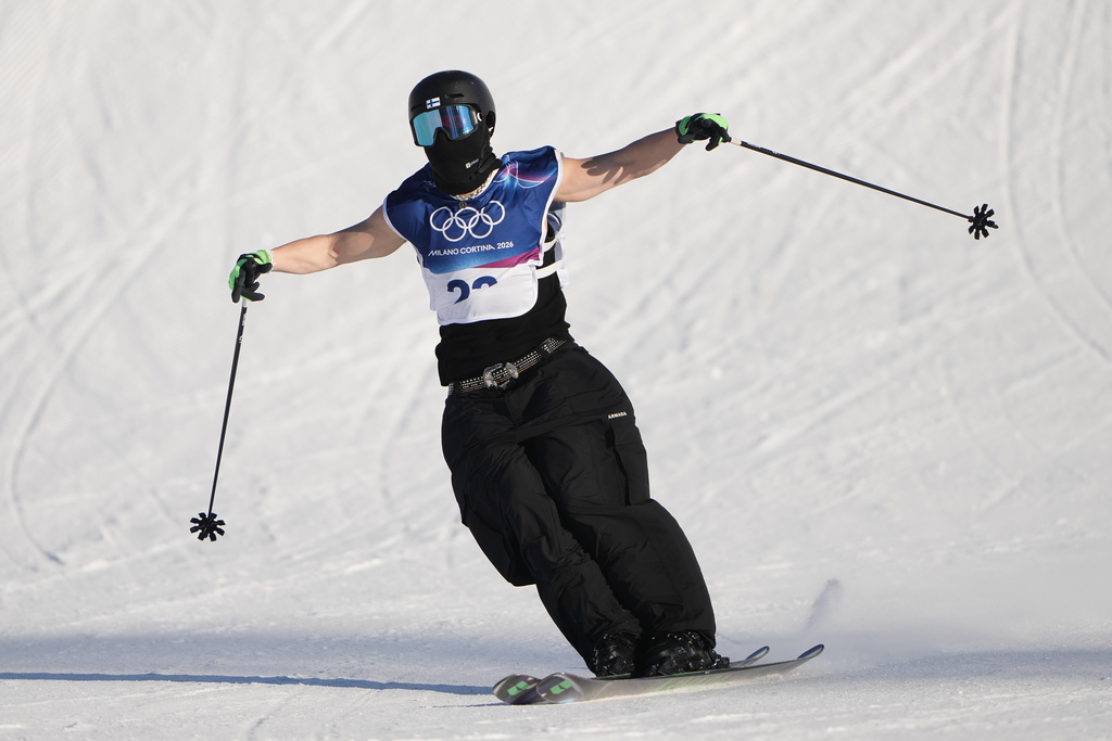 Finland's Kuura Koivisto reacts during men's freestyle skiing slopestyle qualifications at the 2026 Winter Olympics, in Livigno, Italy, Saturday, Feb. 7, 2026. (AP Photo/Lindsey Wasson)