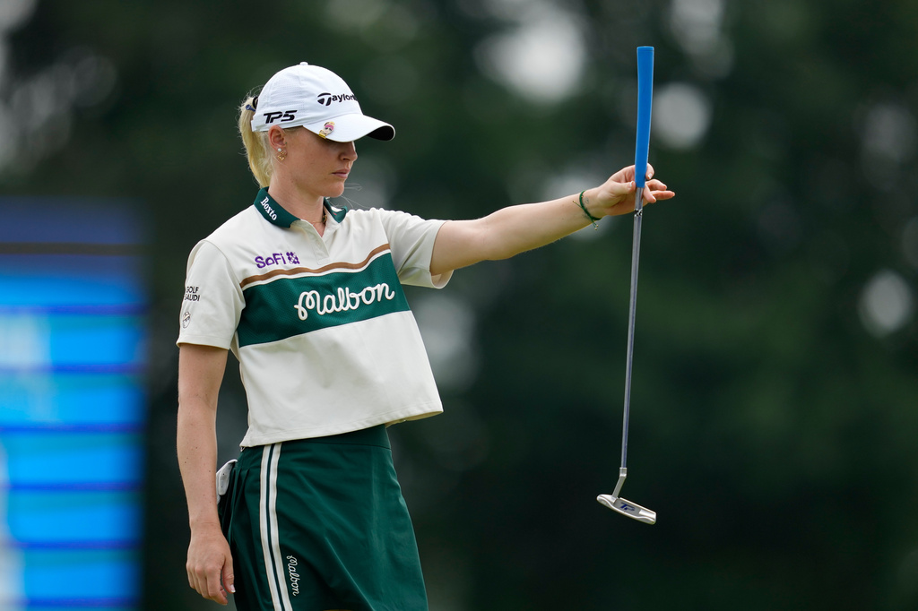 Charley Hull, of England, lines up a putt on the 18th hole during the second round of the Chevron Championship LPGA golf tournament Friday, April 24, 2026, in Houston. (AP Photo/Ashley Landis)