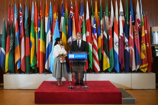Egypt's Khaled El Enany, right, flanked by President of executive board Vera El Khoury Lacoeuilhe speaks to the press after being elected Secretary-General by UNESCO executive board members, at the UNESCO headquarters in Paris, Monday, Oct. 6, 2025. (AP Photo/Thibault Camus) Egypt's Khaled El Enany, right, flanked by President of executive board Vera El Khoury Lacoeuilhe speaks to the press after being elected Secretary-General by UNESCO executive board members, at the UNESCO headquarters in Paris, Monday, Oct. 6, 2025. (AP Photo/Thibault Camus)