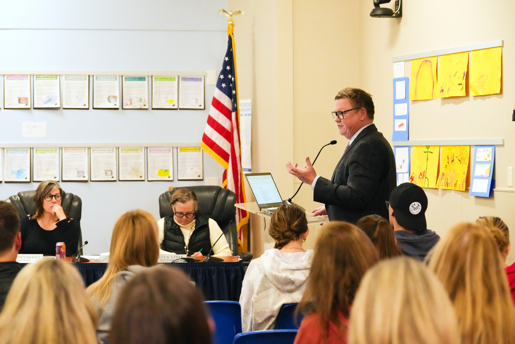 Matthew P. Juhl Darlington, an attorney, speaks on his position on allowing trans athletes to compete in school sports during a meeting of the Tahoe Truckee Unified School District on Wednesday, Dec. 17, 2025 in Truckee, Calif. (AP Photo/Brooke Hess-Homeier)