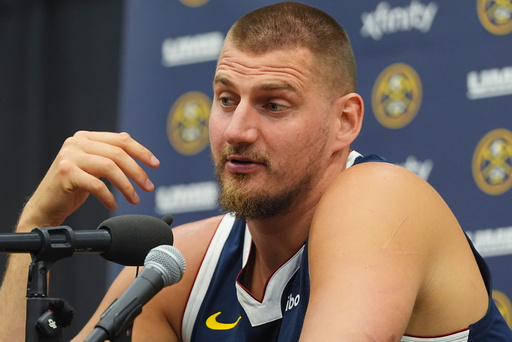 Denver Nuggets center Nikola Jokic responds to questions during an NBA basketball media day news conference Monday, Sept. 29, 2025, in Denver. (AP Photo/David Zalubowski) Denver Nuggets center Nikola Jokic responds to questions during an NBA basketball media day news conference Monday, Sept. 29, 2025, in Denver. (AP Photo/David Zalubowski)