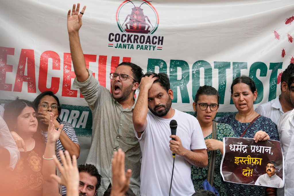 Abhijeet Dipke, center, founder of the Cockroach Janta Party addresses his supporters during a protest rally in New Delhi, India, Saturday, June 6, 2026. (AP Photo/Manish Swarup)