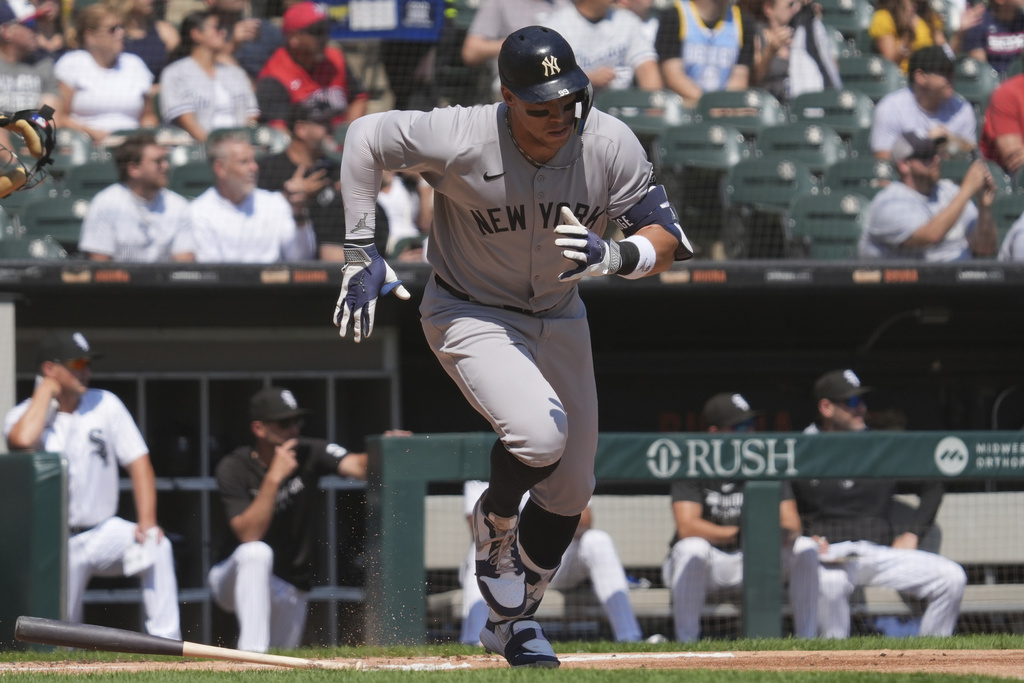 New York Yankees' Aaron Judge runs after hitting a solo home run during the first inning of a baseball game against the Chicago White Sox in Chicago, Sunday, Aug. 31, 2025. (AP Photo/Nam Y. Huh)