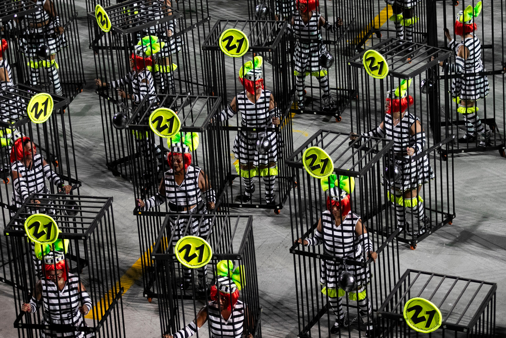 Performers from the Mocidade samba school parade during Carnival celebrations at the Sambadrome in Rio de Janeiro, Monday, Feb. 16, 2026. (AP Photo/Bruna Prado)