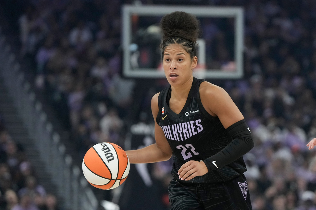 Golden State Valkyries guard Veronica Burton (22) brings the ball up the court against the Dallas Wings during the first half of a WNBA basketball game in San Francisco, Monday, Aug. 17, 2026. (AP Photo/Jeff Chiu)