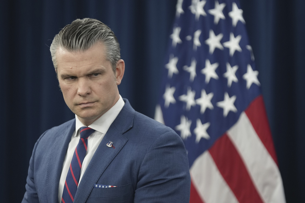 Defense Secretary Pete Hegseth listens during a press briefing at the Pentagon, Monday, March 2, 2026, in Washington. (AP Photo/Mark Schiefelbein)