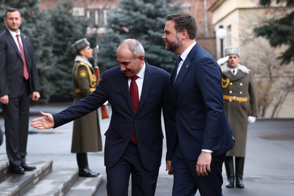 Armenia's Prime Minister Nikol Pashinyan, left, welcomes Vice President JD Vance, at the President's Residence, in Yerevan, Armenia, Monday, Feb. 9, 2026. (Kevin Lamarque/Pool Photo via AP)