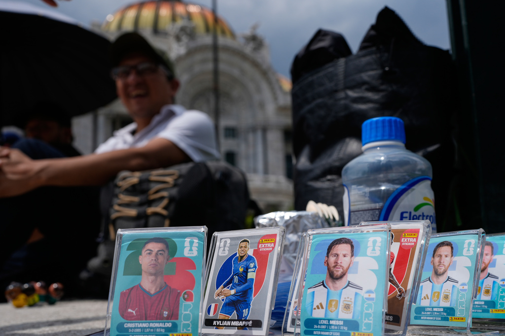 Panini World Cup stickers are displayed in the historic center in Mexico City, Tuesday, June 16, 2026. (AP Photo/Marco Ugarte)