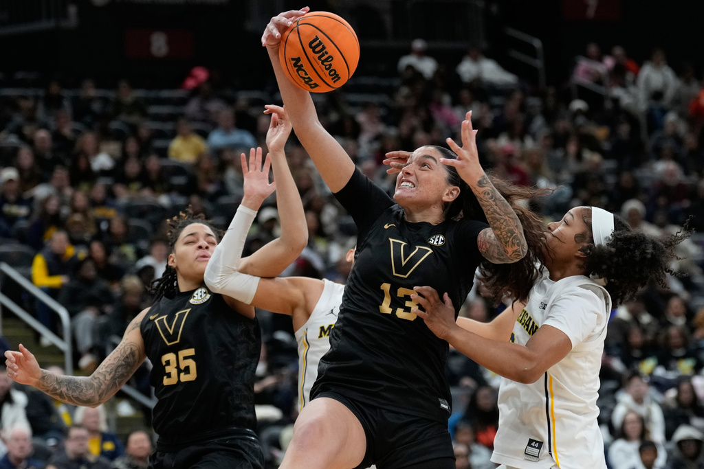 Vanderbilt's Justine Pissott grabs a rebound during the first half of an NCAA women's college basketball game against Michigan in Newark, N.J., Monday, Jan. 19, 2026. (AP Photo/Seth Wenig)