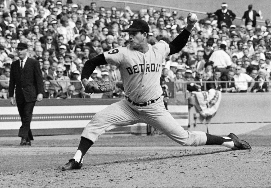 FILE - In this Oct. 3, 1968, file photo, Mickey Lolich of the Detroit Tigers is shown pitching during the second game of the World Series against the St. Louis Cardinals at Busch Stadium in St. Louis. (AP Photo/File)