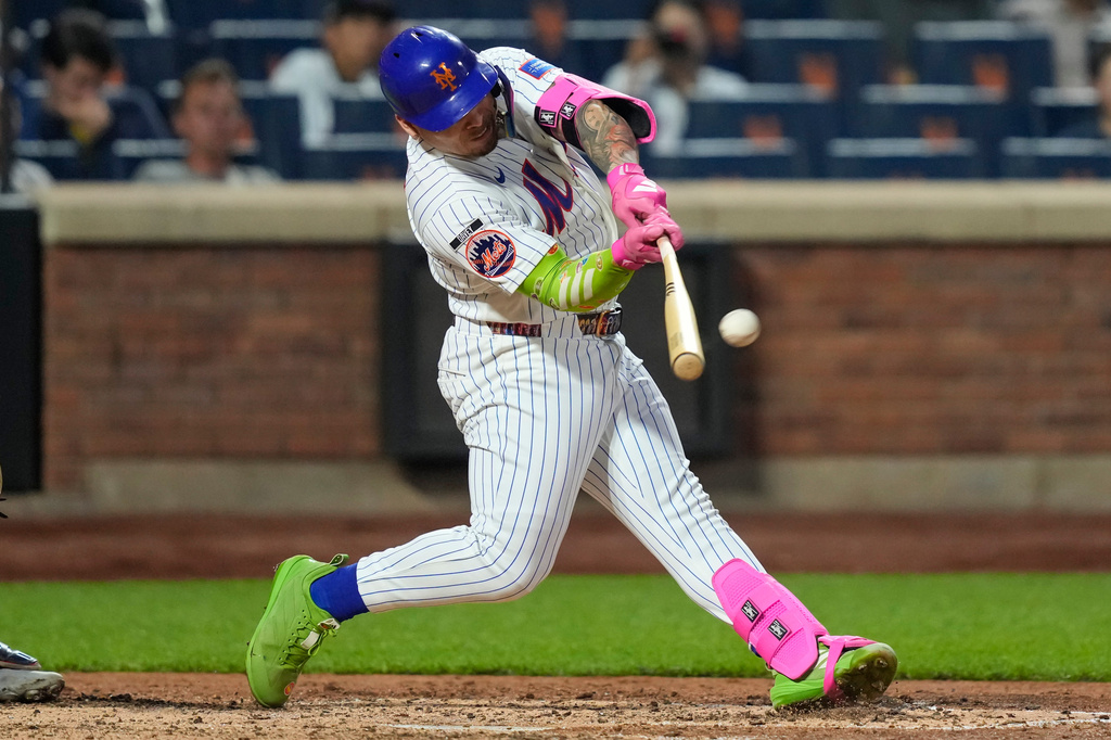New York Mets designated hitter Francisco Alvarez hits a two-run home run during the fourth inning of a baseball game against the St. Louis Cardinals, Wednesday, June 10, 2026, in New York. (AP Photo/Yuki Iwamura)