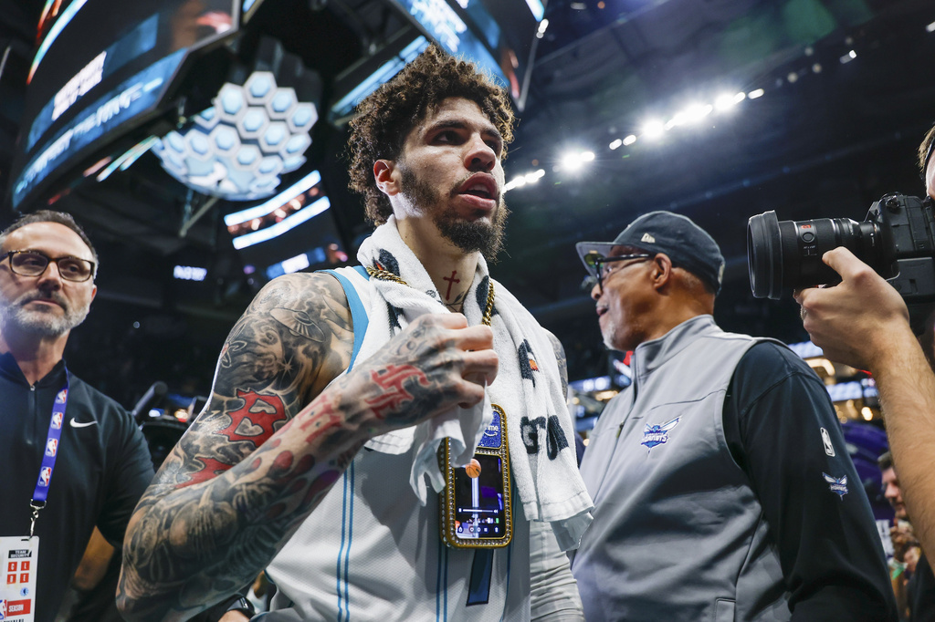 Charlotte Hornets guard LaMelo Ball walks off the court after an NBA play-in tournament basketball game against the Miami Heat in Charlotte, N.C., Tuesday, April 14, 2026. (AP Photo/Nell Redmond)