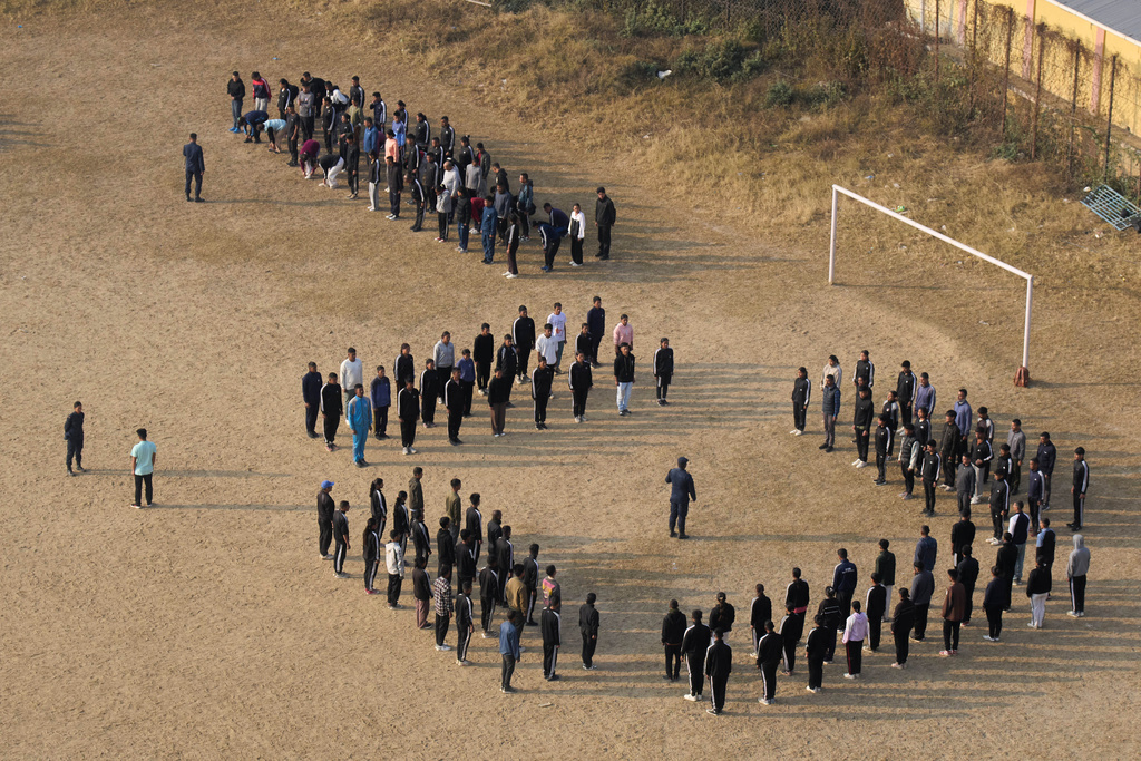 Newly recruited temporary police officers participate in training session ahead of the March 5 general election in Dhankuta, about 390 kilometers (242 miles) east of Kathmandu, Nepal, Wednesday, Feb. 4, 2026. (AP Photo/Niranjan Shrestha ,File)
