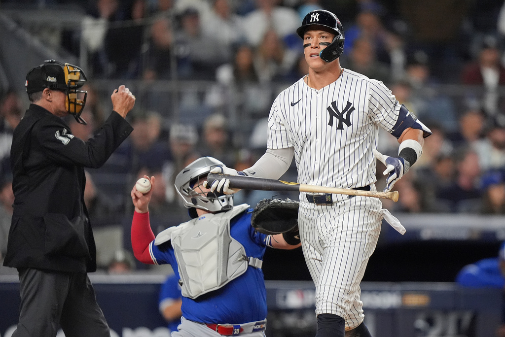 New York Yankees' Aaron Judge reacts after striking out against the Toronto Blue Jays during the eighth inning of Game 4 of baseball's American League Division Series, Wednesday, Oct. 8, 2025, in New York. (AP Photo/Frank Franklin II)