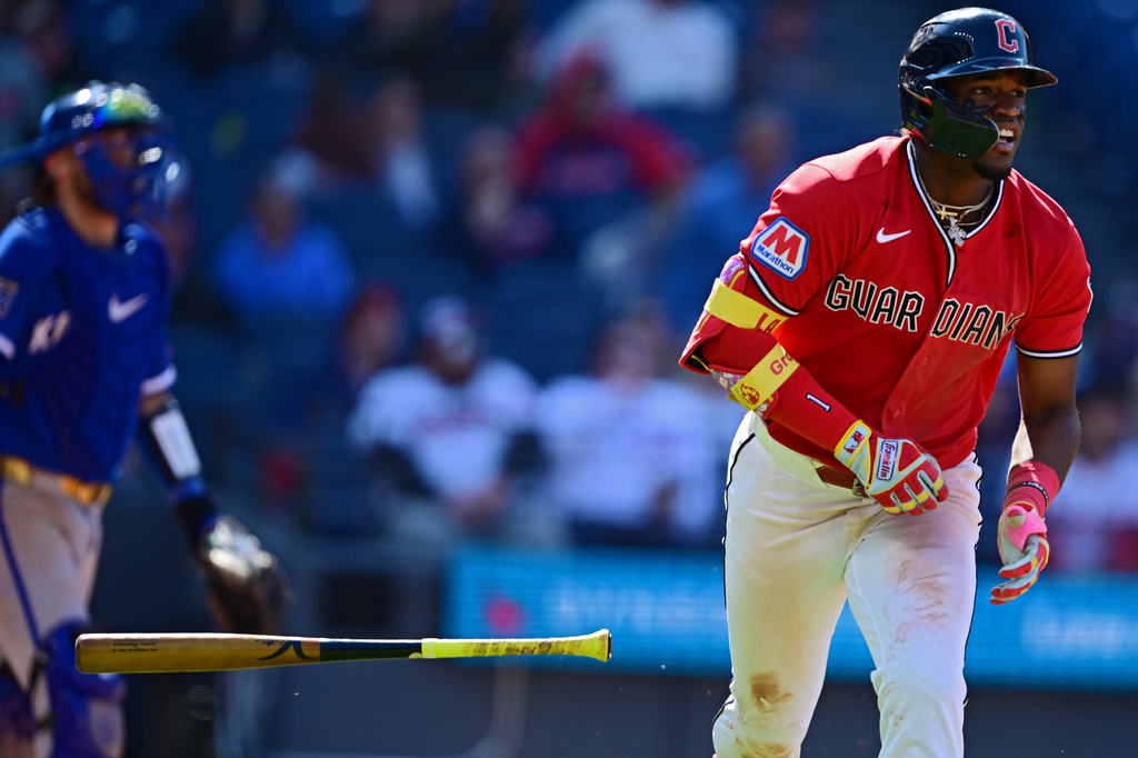 Cleveland Guardians' Angel Martinez watches his ball while running the bases after hitting a grand slam off Kansas City Royals relief pitcher Steven Cruz during the eighth inning of a baseball game, Wednesday, April 8, 2026, in Cleveland. (AP Photo/David Dermer)