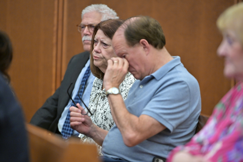 Paula Musgrove, center and Mike Musgrove, right, parents of Lindsay Clancy react to testimony during Clancy's murder trial, Thursday, Aug. 13, 2026., in Plymouth, Mass. (AP Photo/Josh Reynolds, Pool)