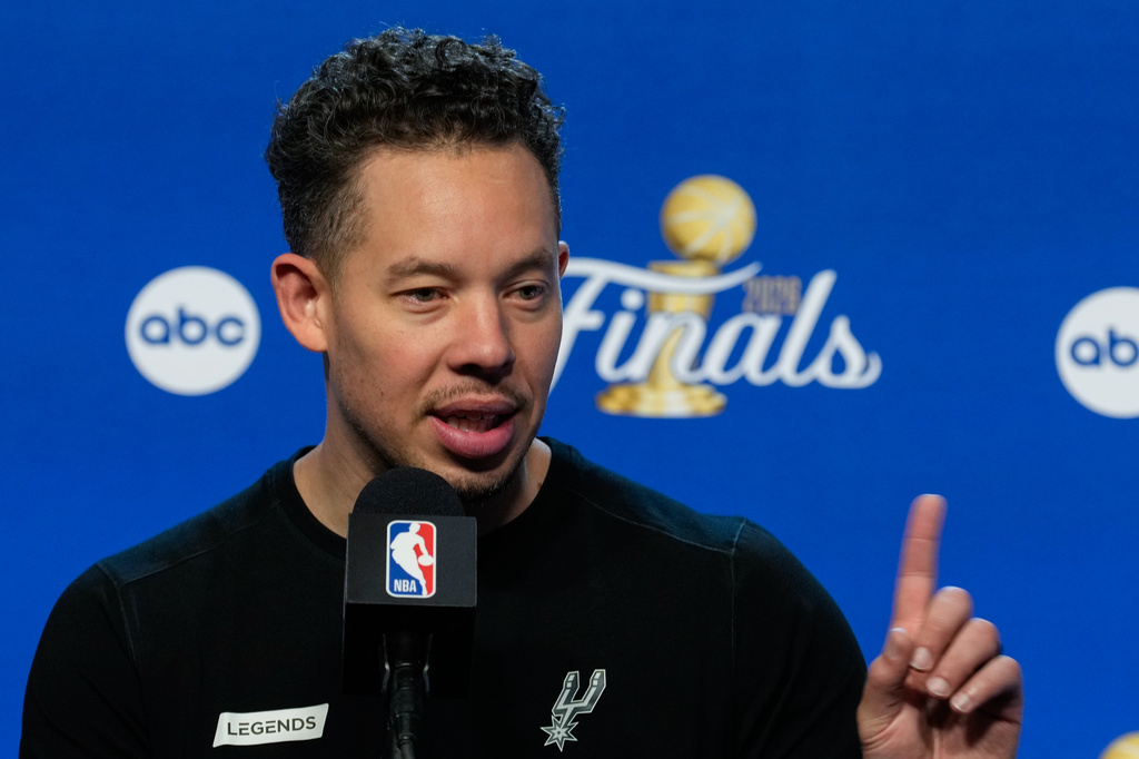 San Antonio Spurs head coach Mitch Johnson speaks during a news conference prior to Game 5 of the NBA Finals basketball series against the New York Knicks, Friday, June 12, 2026, in San Antonio. (AP Photo/Ross D. Franklin)