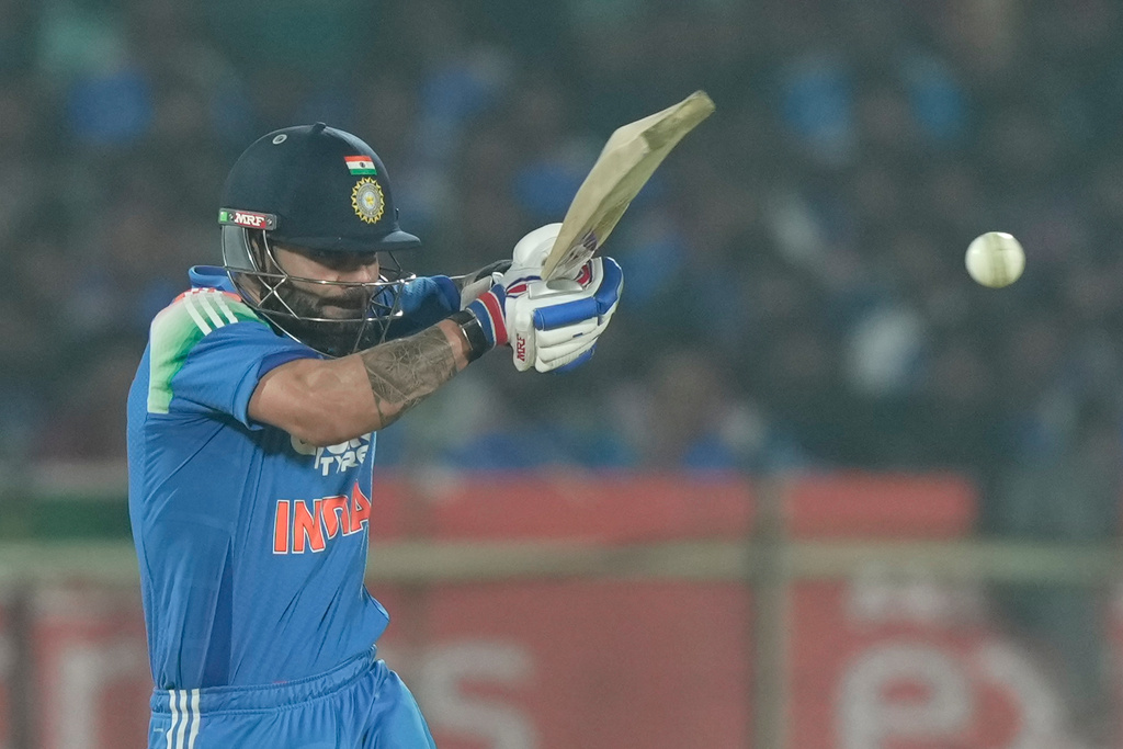 India's Virat Kohli plays a shot during the third One Day International cricket match between India and South Africa in Visakhapatnam, India, Saturday, Dec. 6, 2025. (AP Photo/Mahesh Kumar A.)