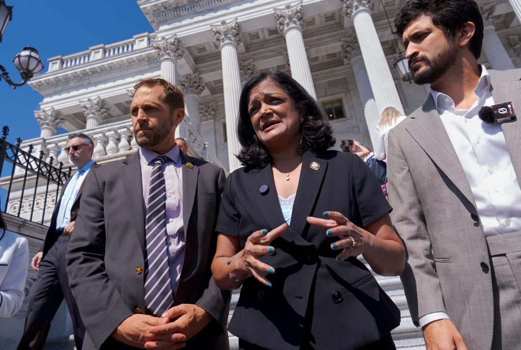From left, Rep. Jason Crow, D-Colo., Rep. Pramila Jayapal, D-Wash., and Rep. Greg Casar, D-Texas, talk to reporters just after the House narrowly passed a resolution to halt U.S. military action in Iran, at the Capitol in Washington, Thursday, July 23, 2026. (AP Photo/J. Scott Applewhite)