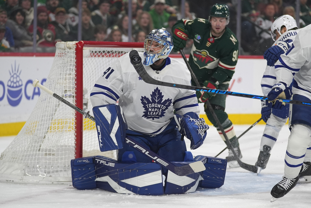 Toronto Maple Leafs goaltender Dennis Hildeby (41) watches the puck during the first period of an NHL hockey game against the Minnesota Wild, Sunday, March 15, 2026, in St. Paul, Minn. (AP Photo/Abbie Parr)