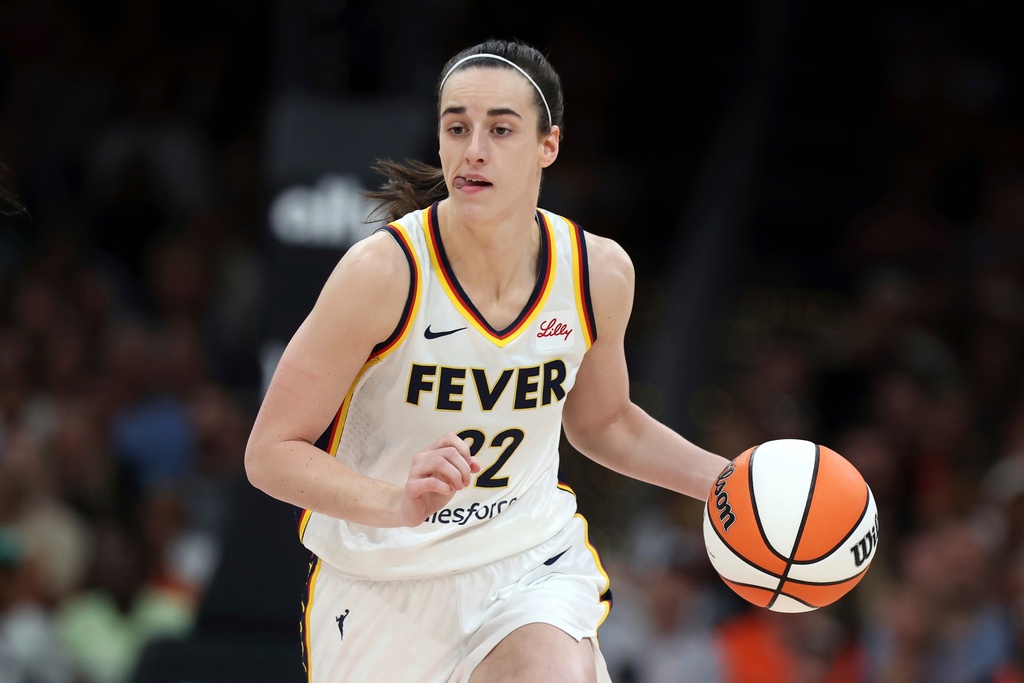 FILE - Indiana Fever's Caitlin Clark plays against the Connecticut Sun during the first half of a WNBA basketball game, July 15, 2025, in Boston. (AP Photo/Michael Dwyer, File)