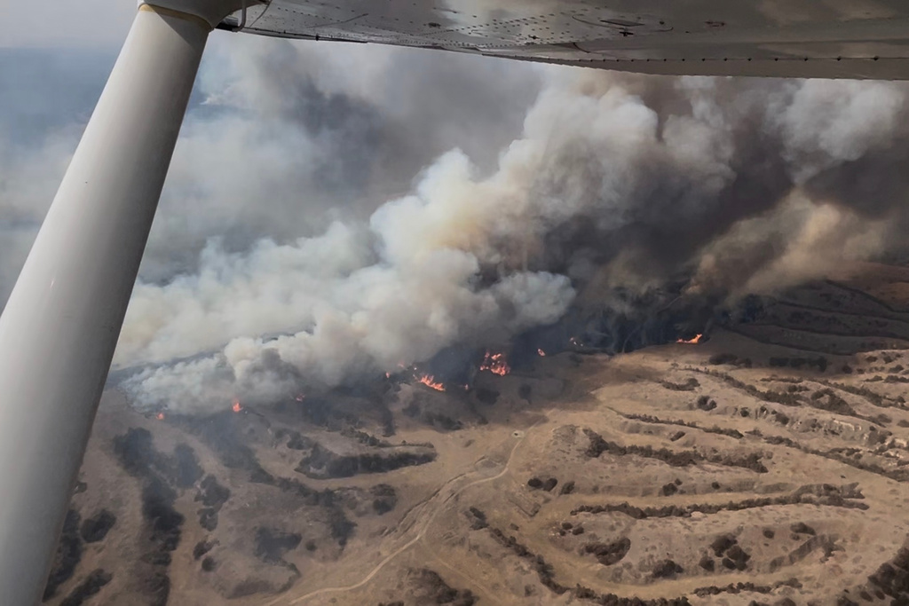 This image made from a video provided by the Nebraska State Patrol shows the Cottonwood Fire in Dawson County, Neb., on Friday, March 13, 2026. (Nebraska State Patrol via AP)