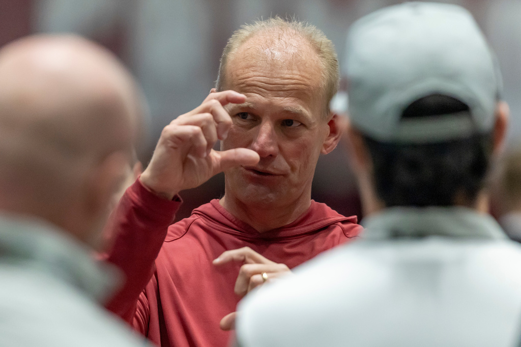 FILE - Alabama head coach Kalen DeBoer talks with visitors during Alabama's NFL football pro day, Wednesday, March 25, 2026, in Tuscaloosa, Ala. (AP Photo/Vasha Hunt, File)