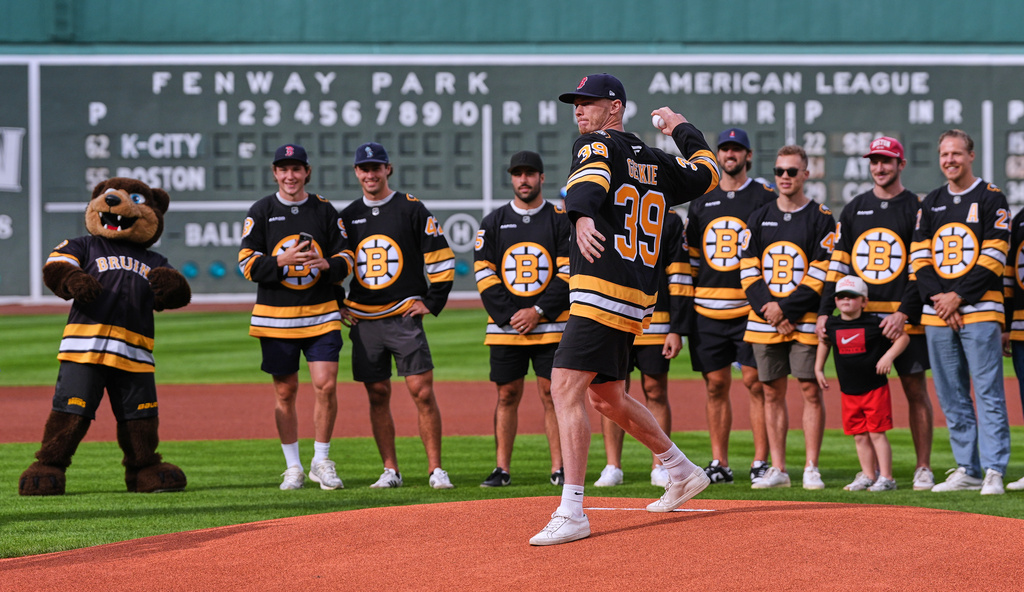 Bruins goalie Jeremy Swayman and some teammates put away sticks to take BP at Fenway Park