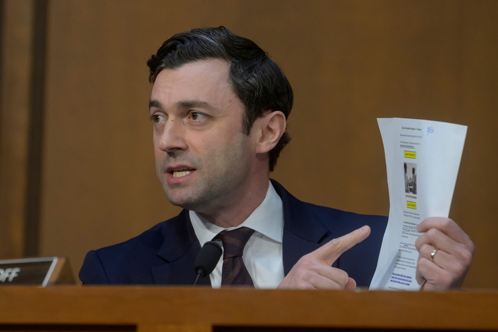 Sen. Jon Ossoff, D-Ga., questions the witnesses during a Senate Committee on Intelligence hearing to examine worldwide threats, on Capitol Hill, Wednesday, March 18, 2026, in Washington. (AP Photo/Rod Lamkey, Jr.)