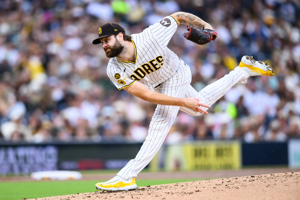 San Diego Padres pitcher Lucas Giolito delivers during the second inning of a baseball game against the Athletics, Saturday, May 23, 2026, in San Diego. (AP Photo/William Liang)