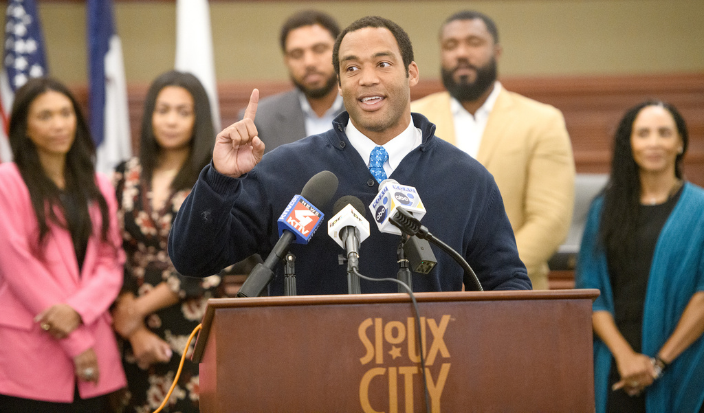 George Foreman IV, son of boxer George Foreman, gestures during a press conference held Thursday, April 16, 2026, to announce that George Foreman had been buried in Sioux City's Logan Park Cemetery following his death in 2025. (Tim Hynds/Sioux City Journal via AP)