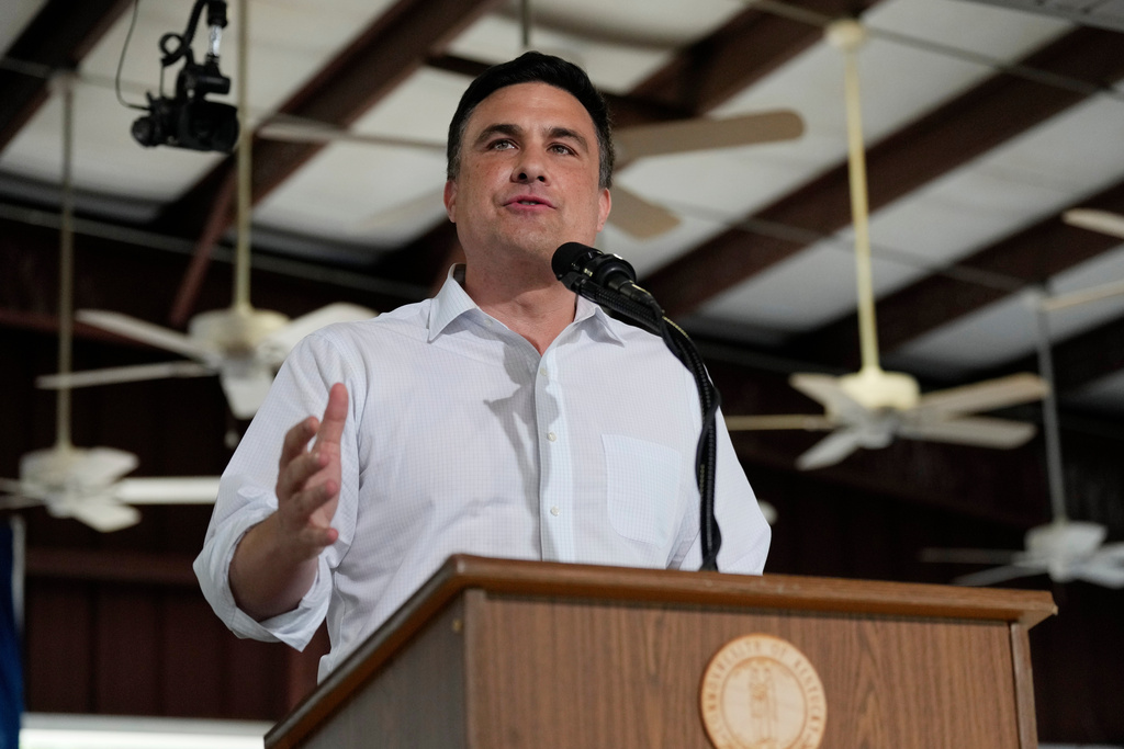FILE - Lexington tech entrepreneur Nate Morris speaks at the annual Fancy Farm picnic, Aug. 2, 2025, in Fancy Farm, Ky. (AP Photo/Mark Humphrey, File)