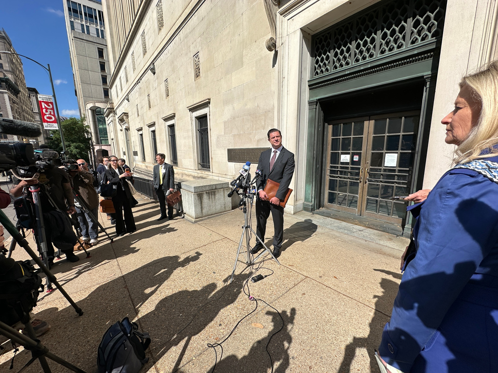 Attorney Matthew Seligman, representing Democratic state legislators, speaks with the media following a hearing on new congressional maps before the state Supreme Court in Richmond, Va., on Monday, April 27, 2026. (AP Photo/Allen G. Breed)