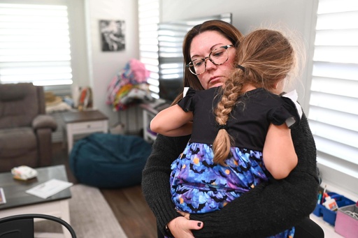 Jennifer Bittner holds her 6-year-old daughter Amelia at their home on Wednesday, Oct. 29, 2025, in Pflugerville, Texas. (AP Photo/Jack Myer) Jennifer Bittner holds her 6-year-old daughter Amelia at their home on Wednesday, Oct. 29, 2025, in Pflugerville, Texas. (AP Photo/Jack Myer)